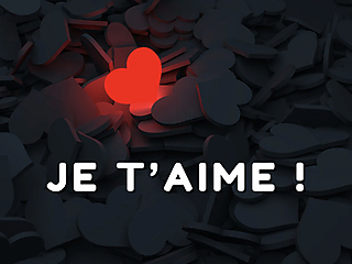 Carte d'amour virtuelle avec un coeur rouge lumineux se démarquant parmi de nombreux cœurs sombres, avec les mots 'Je t'aime !' mis en évidence.